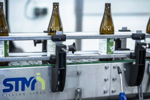 Conveyors for bottles cans and boxes
